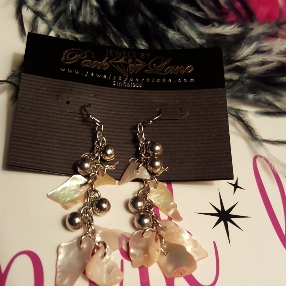 Park Lane pebble earrings.